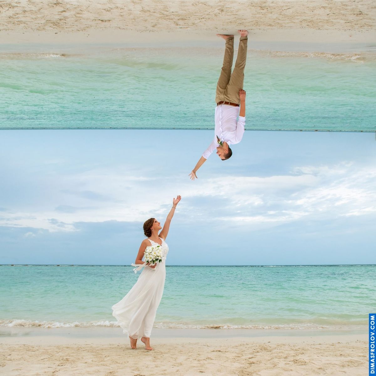 Surreal wedding photo — bride reaching for groom upside-down on mirrored horizon