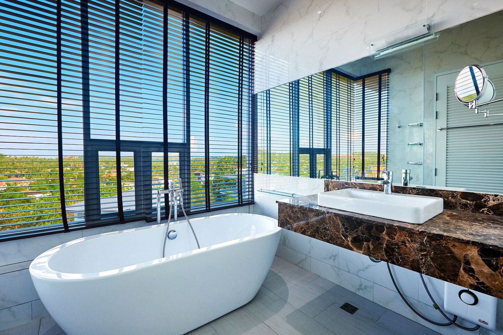 Modern bathroom design: freestanding bathtub and minimalist decor with natural light