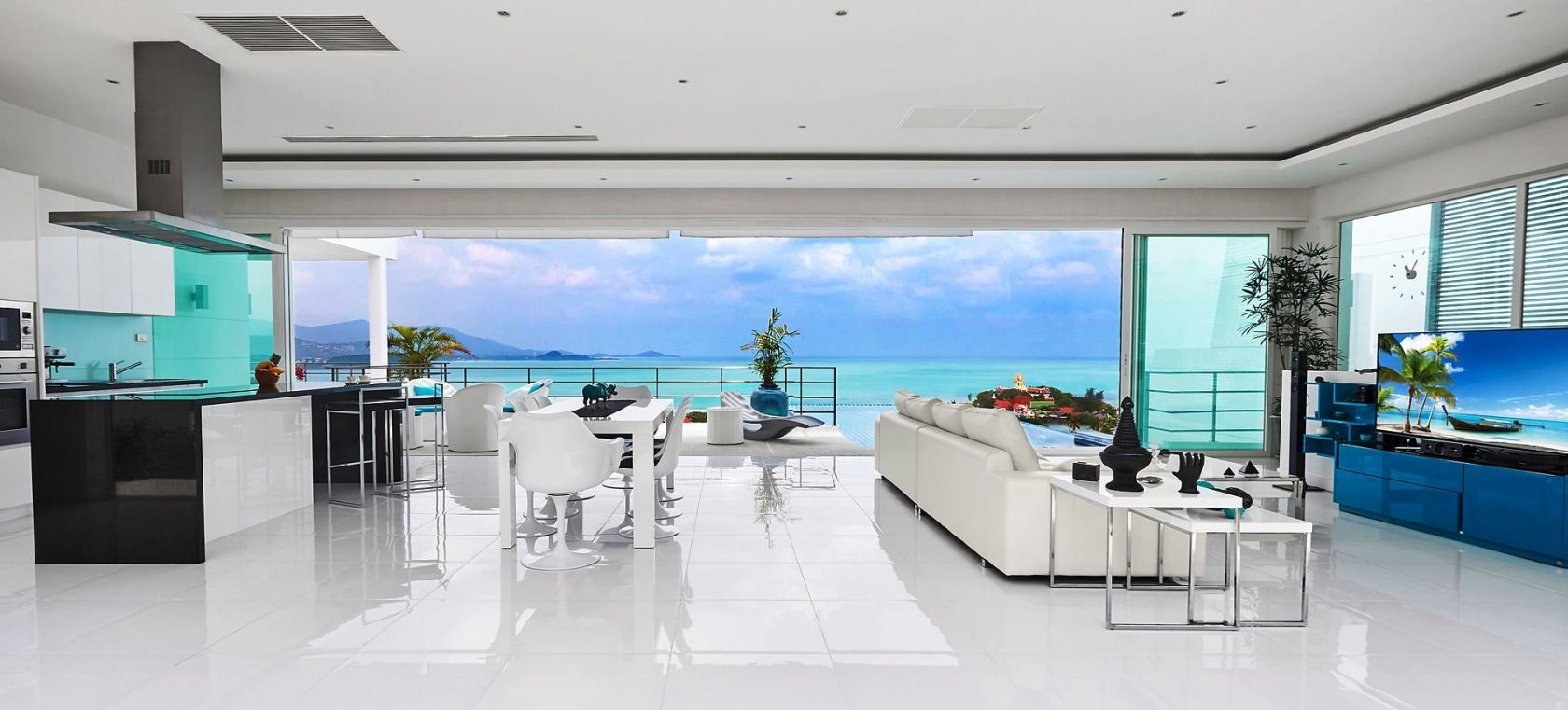 Modern hotel interior: open living space with stylish furniture and city view