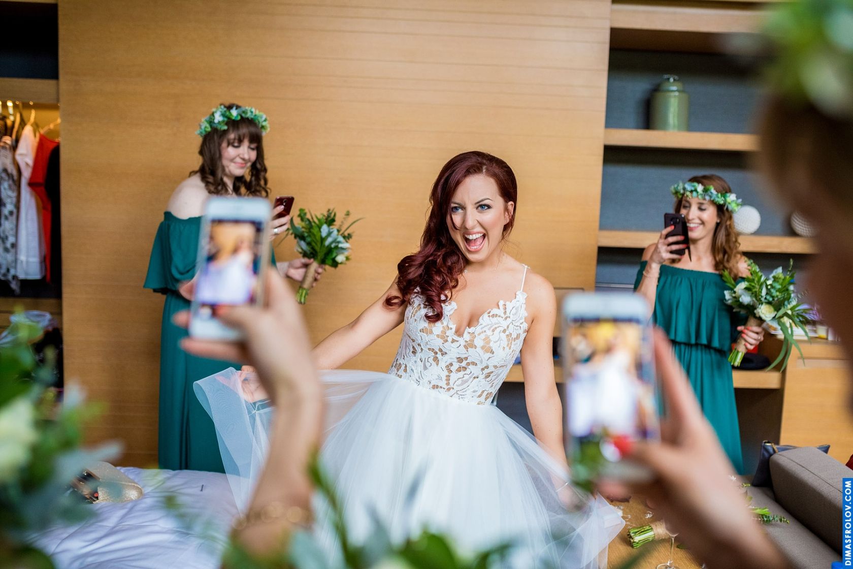 Bridesmaids capturing the bride-s excitement before the ceremony — fun wedding moment
