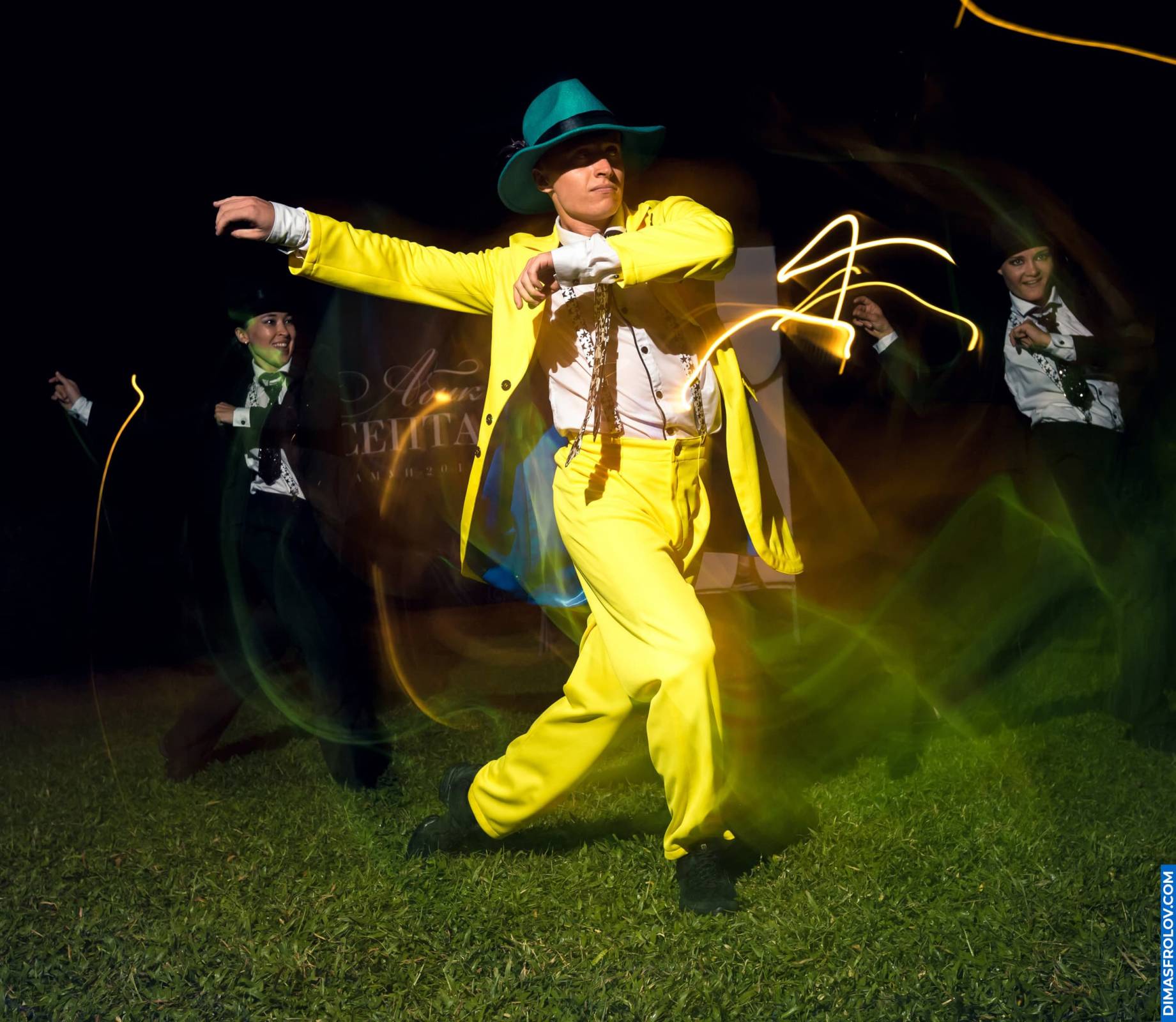 Energetic dancer in yellow costume lighting up restaurant party stage