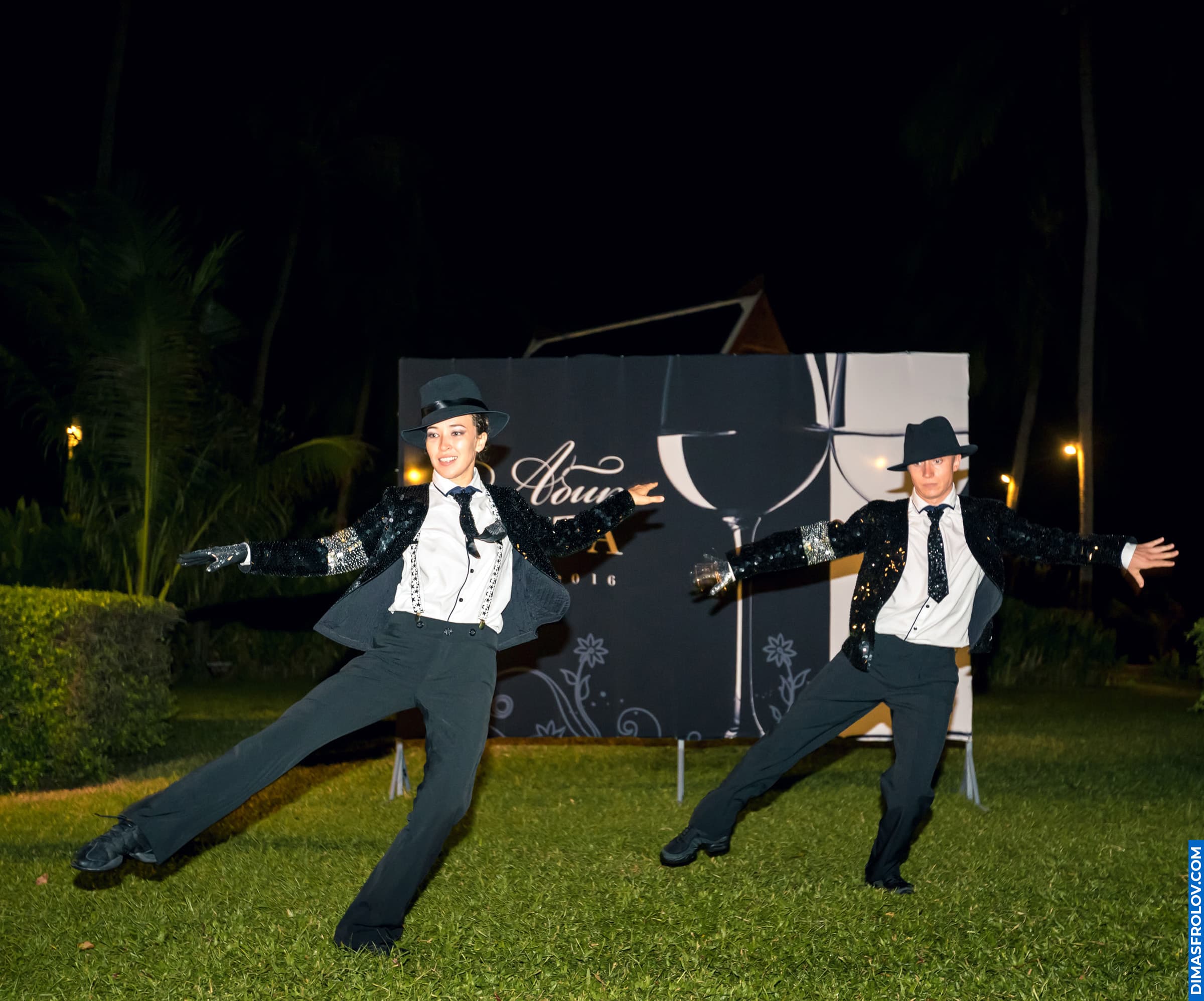 Dance performance at restaurant birthday event — energetic show on outdoor stage