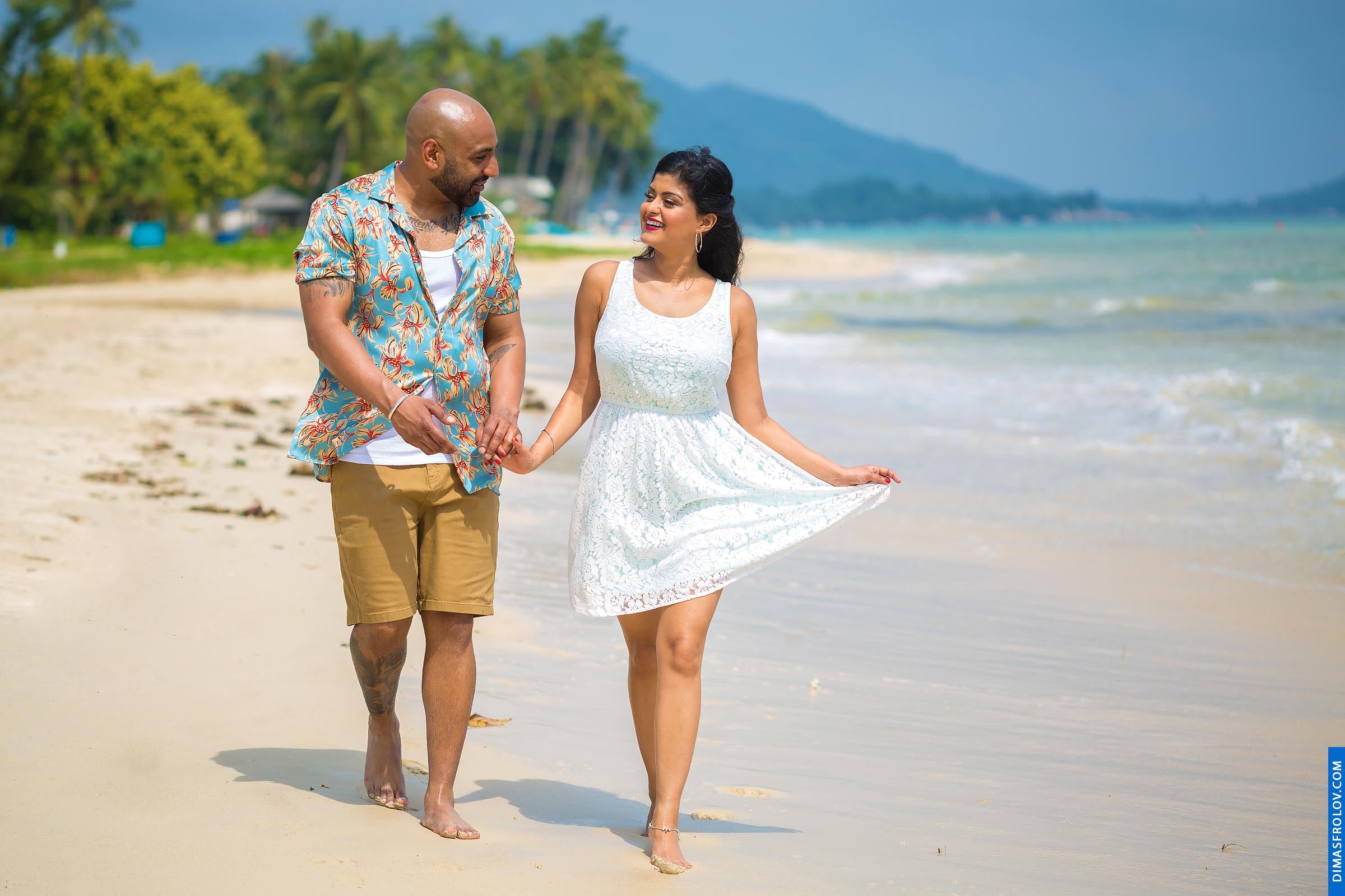Romantic beach walk captured naturally