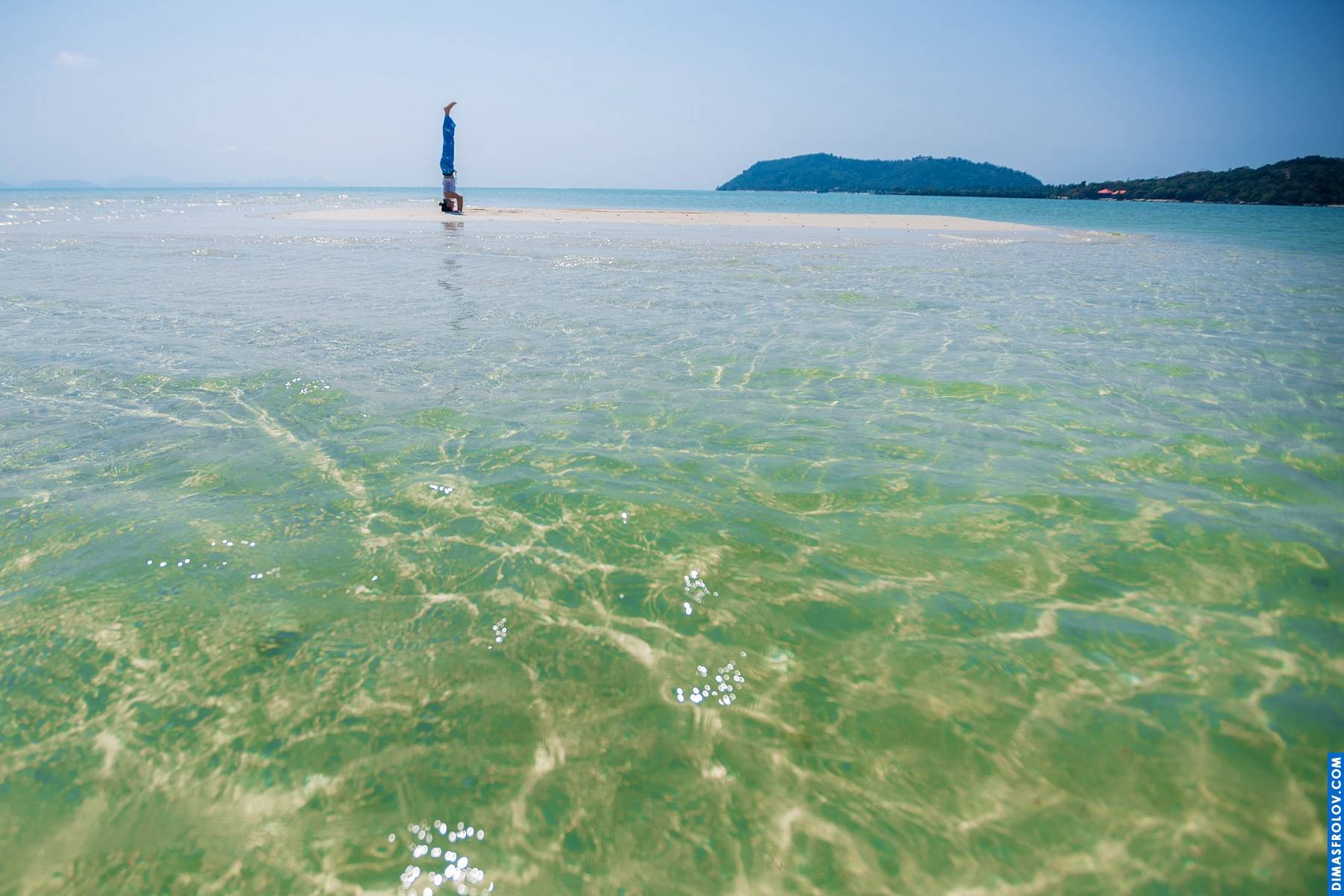 Secluded beach escape: calm turquoise sea meeting a pristine white shore